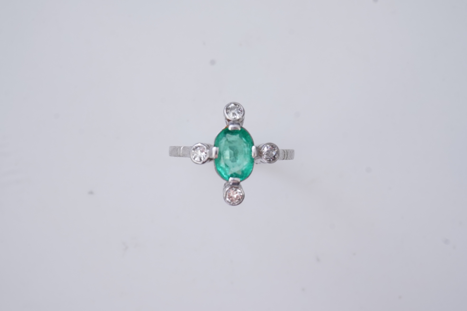 An Art Deco emerald and diamond ring, first half 20th century